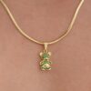 Dije oso verde en oro laminado 18K Piangere elegante