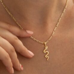 Dije serpiente con cristal en oro laminado 18K Piangere elegante